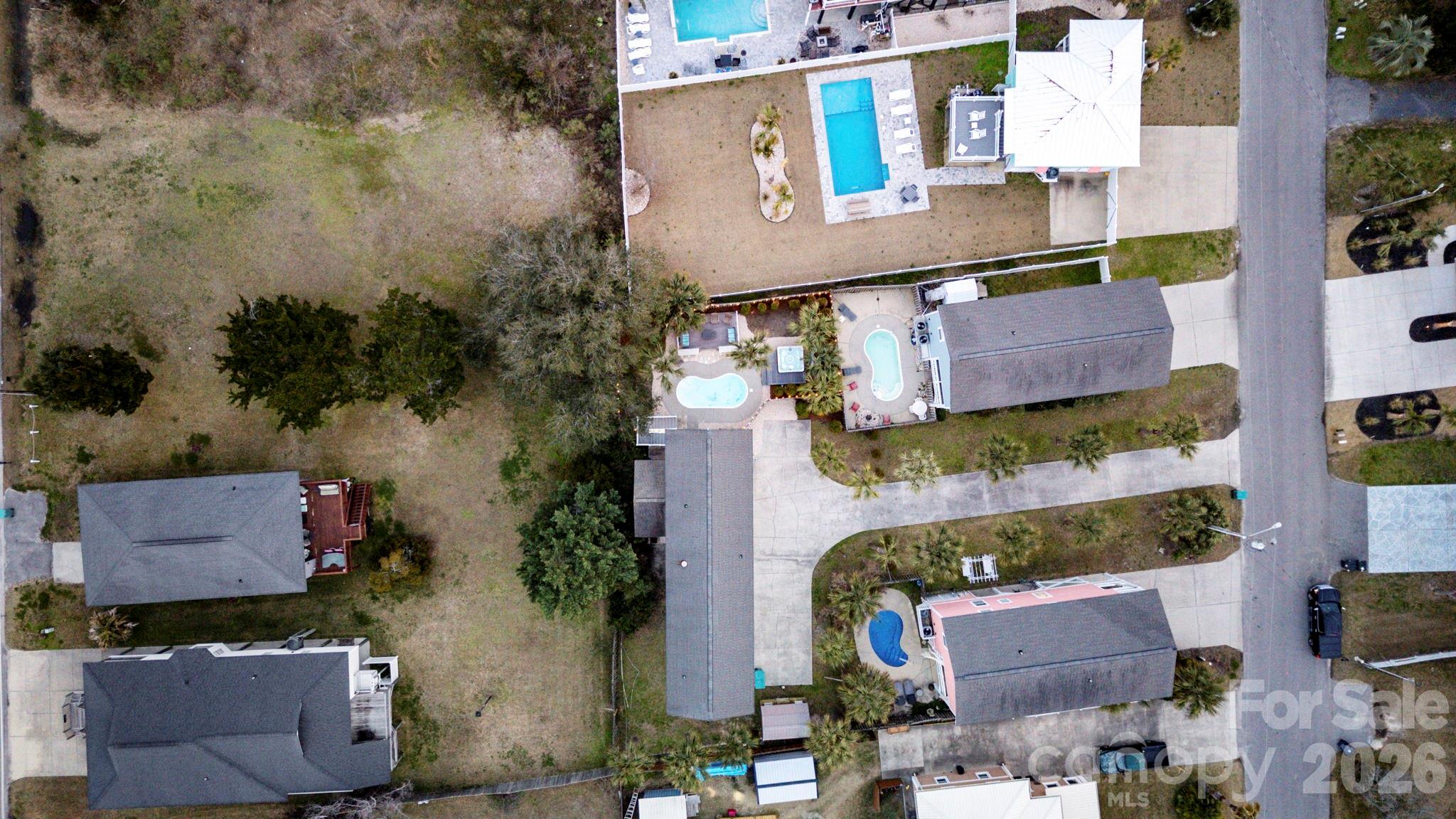 122 Rainbow Drive Murrells Inlet, SC 29576 - Photo 32 of 39 an aerial view of residential house with outdoor space and parking