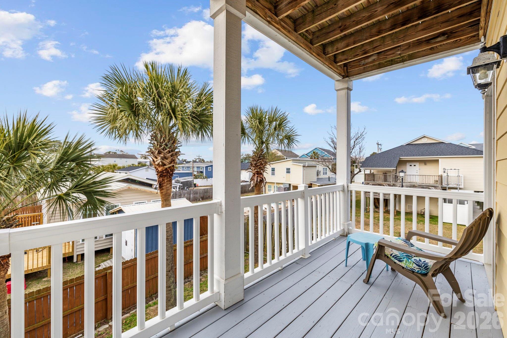 122 Rainbow Drive Murrells Inlet, SC 29576 - Photo 33 of 39 a view of a chair and table in the balcony