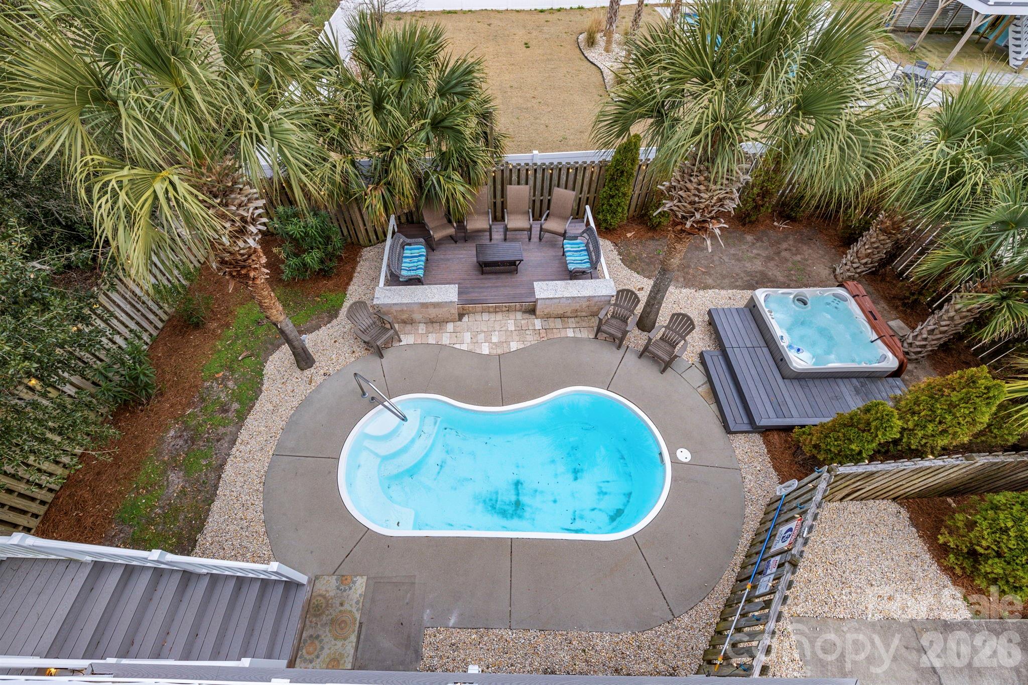 122 Rainbow Drive Murrells Inlet, SC 29576 - Photo 36 of 39 an aerial view of a house with outdoor space and swimming pool