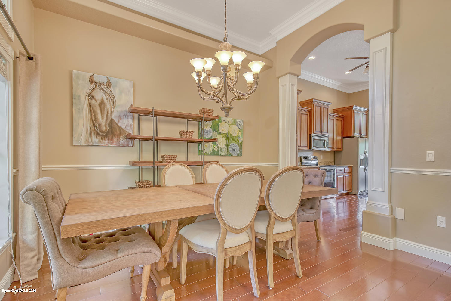 3960 Crooked Mile Road Merritt Island, FL 32952 - Photo 8 of 42 a dining room with wooden floor and breakfast area