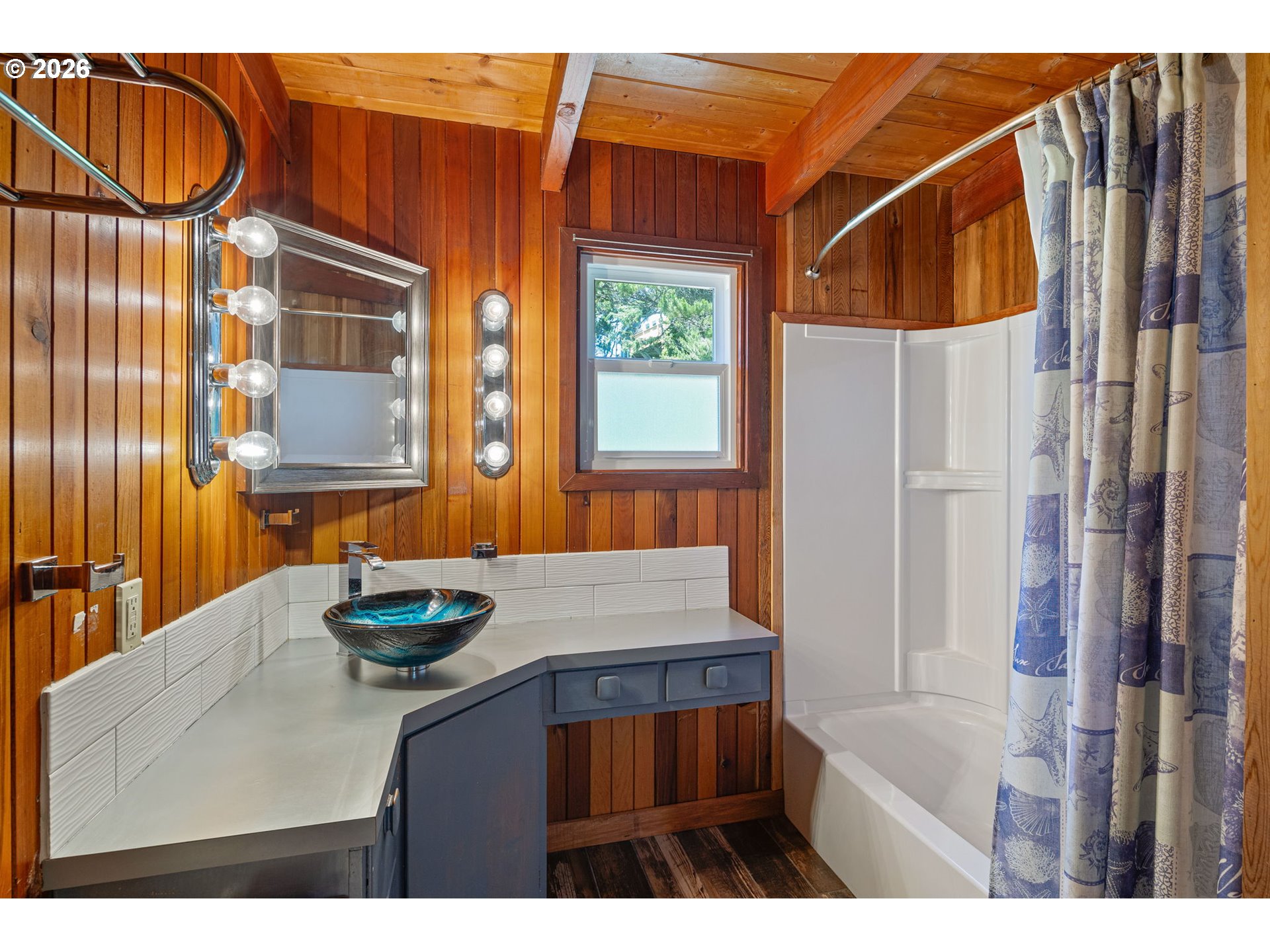 88481 1st Avenue Florence, OR 97439 - Photo 11 of 43 a bathroom with a sink and a mirror
