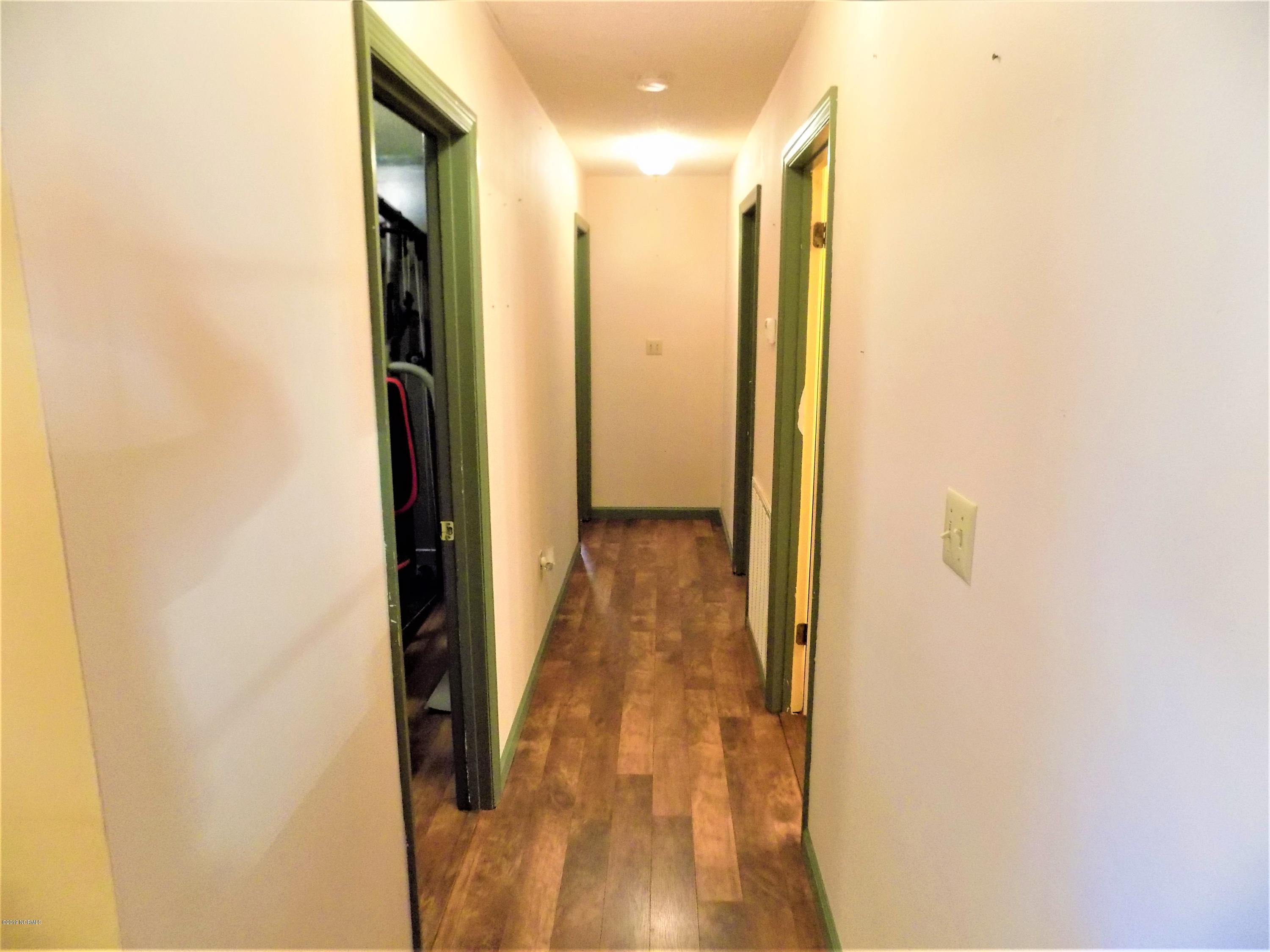 223 Cole Road Beulaville, NC 28518 - Photo 18 of 40 HALL FROM LIVING ROOM TO BEDROOMS