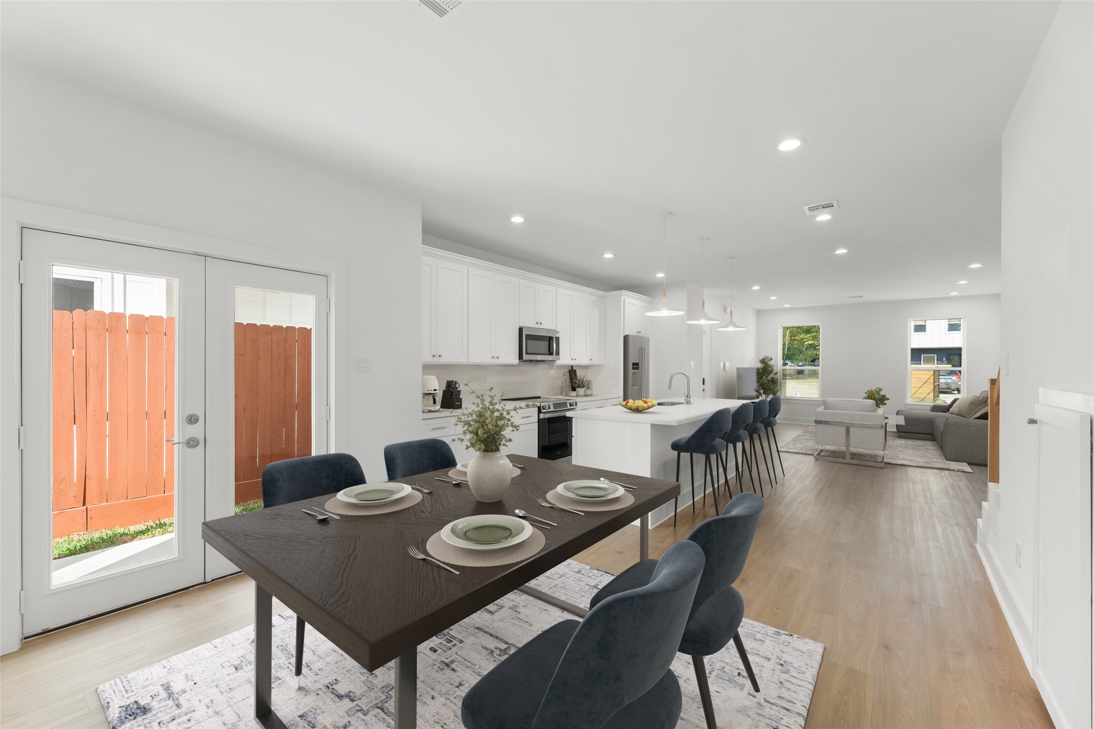 1475 Ferguson Way Houston, TX 77088 - Photo 2 of 27 a view of a dining room with furniture and wooden floor