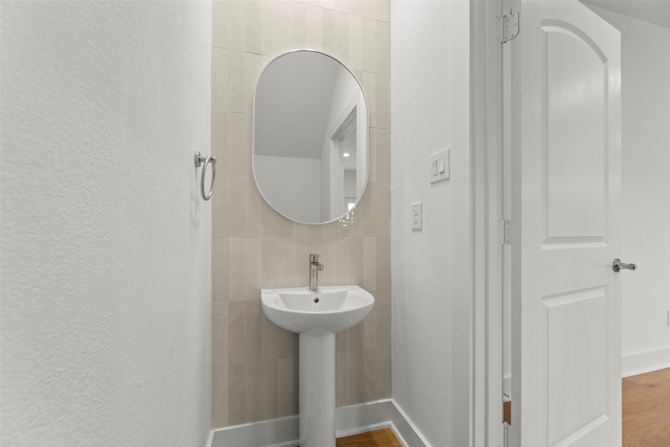 1475 Ferguson Way Houston, TX 77088 - Photo 21 of 27 a bathroom with a sink and a mirror