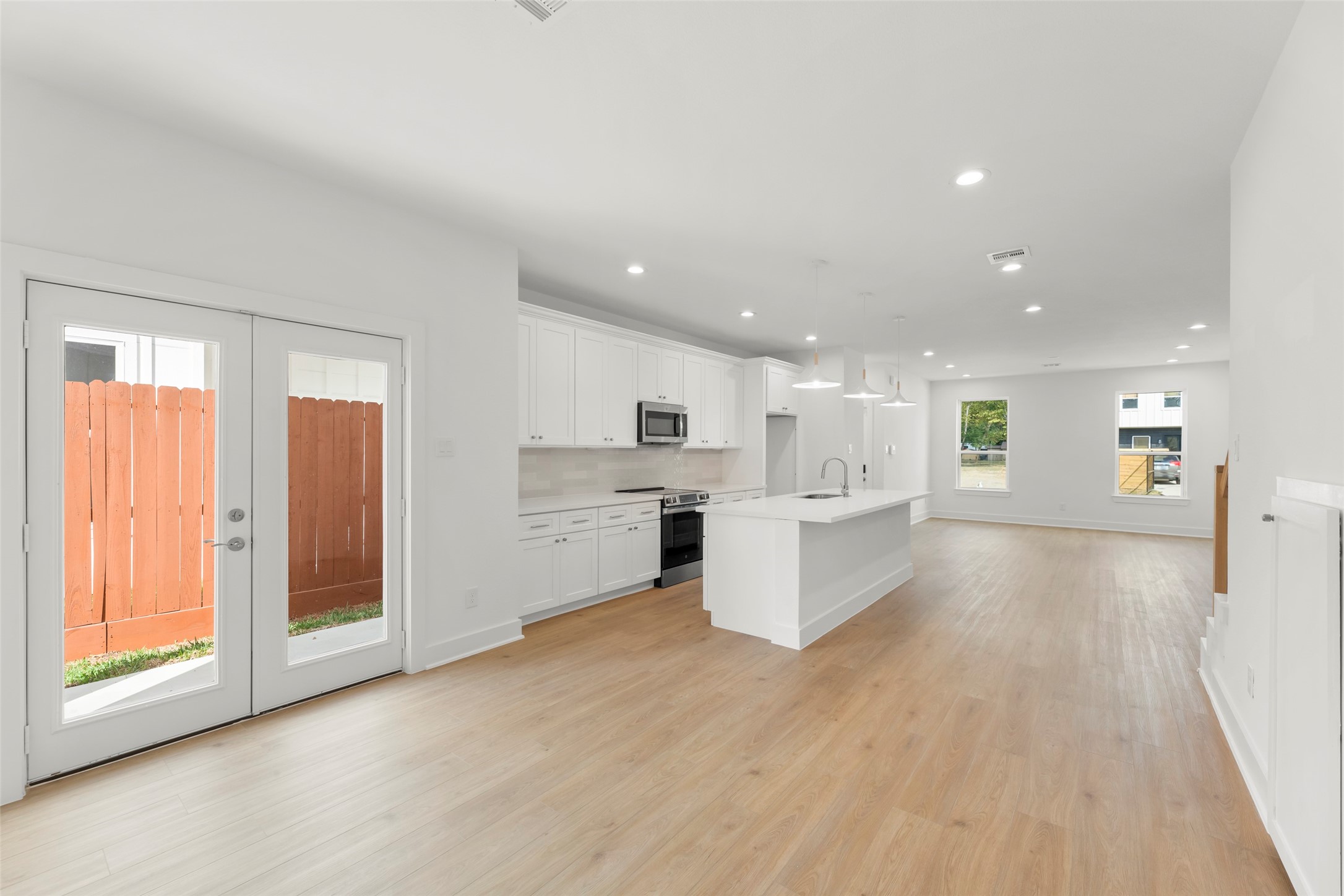 1475 Ferguson Way Houston, TX 77088 - Photo 6 of 27 a view of kitchen with wooden floor