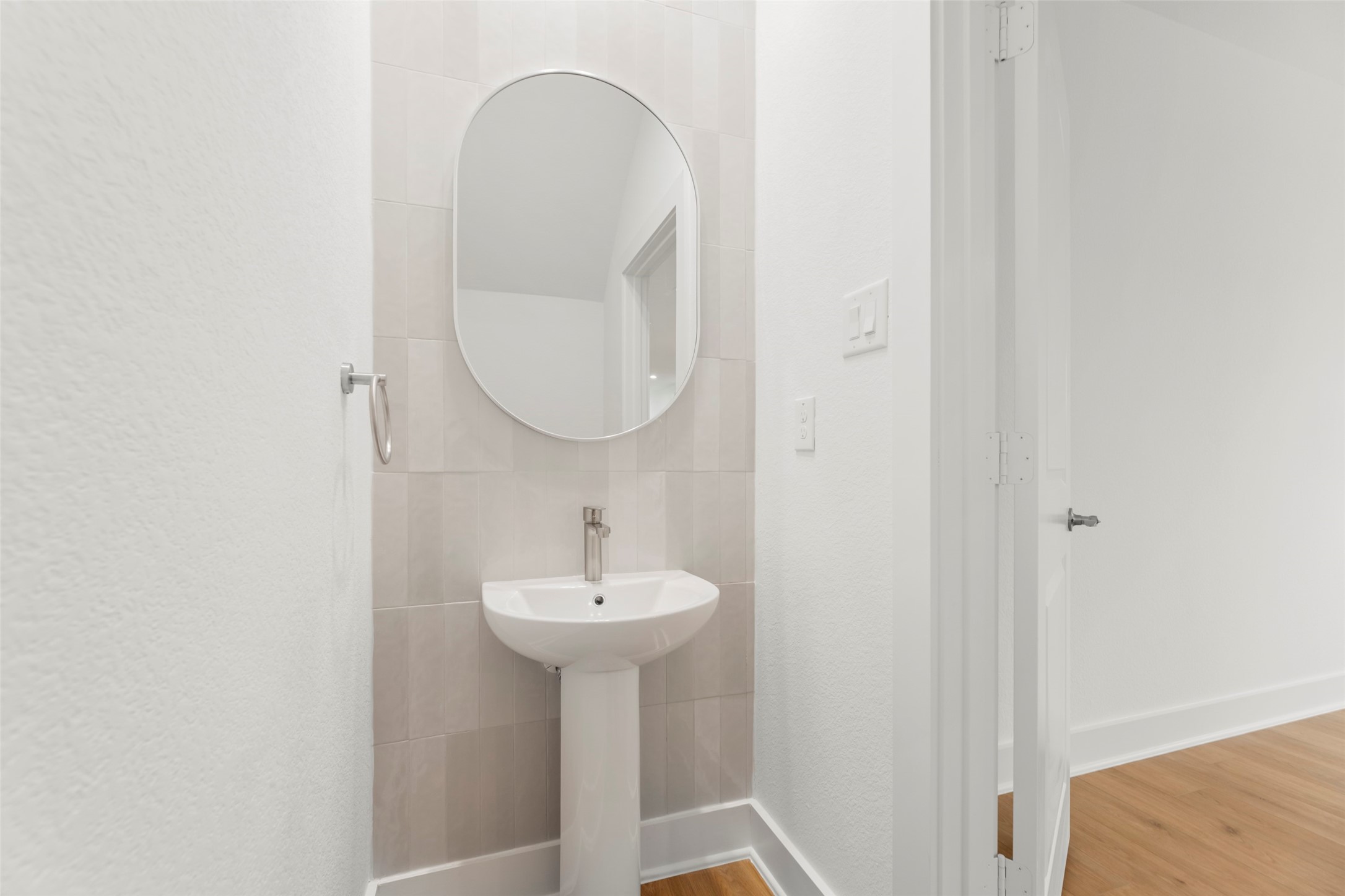 1475 Ferguson Way Houston, TX 77088 - Photo 7 of 27 a bathroom with a sink and a mirror