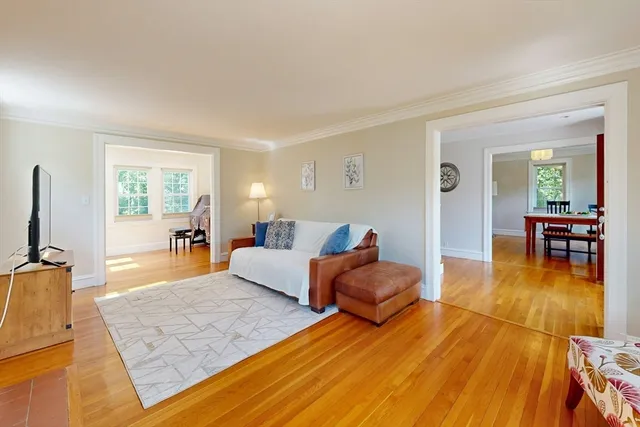 a living room with furniture and a table