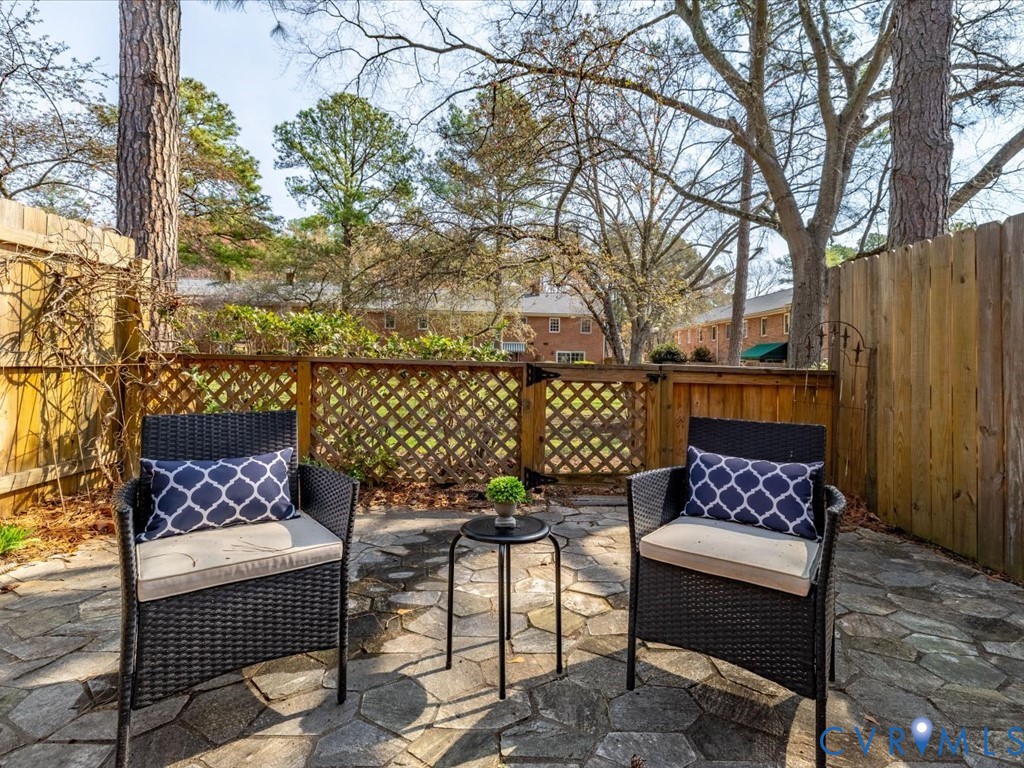 9107 Derbyshire Road, Unit J Henrico, VA 23229 - Photo 16 of 38 a outdoor living space with furniture and a potted plant