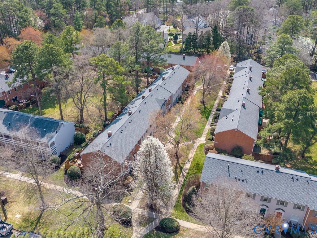 9107 Derbyshire Road, Unit J Henrico, VA 23229 - Photo 32 of 38 an aerial view of house with yard and mountain view in back