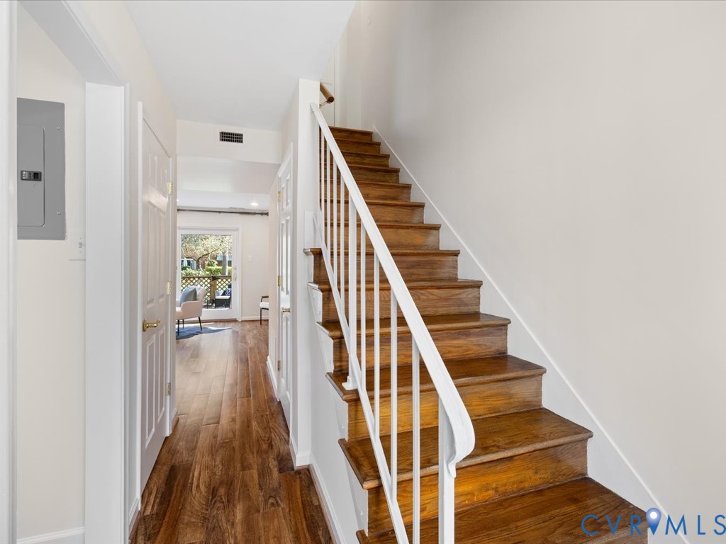 9107 Derbyshire Road, Unit J Henrico, VA 23229 - Photo 5 of 38 a view of entryway and hall with wooden floor