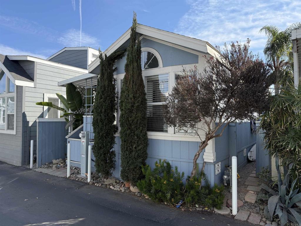 front view of a house with a street