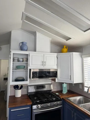 a bedroom with a bed and a television in it