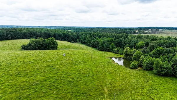 a view of lake with green space