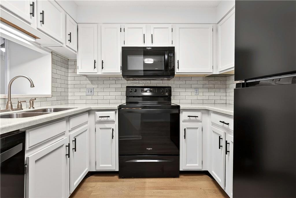 1800 Clairmont Lake, Unit A227 Decatur, GA 30033 - Photo 11 of 69 a kitchen with cabinets and appliances