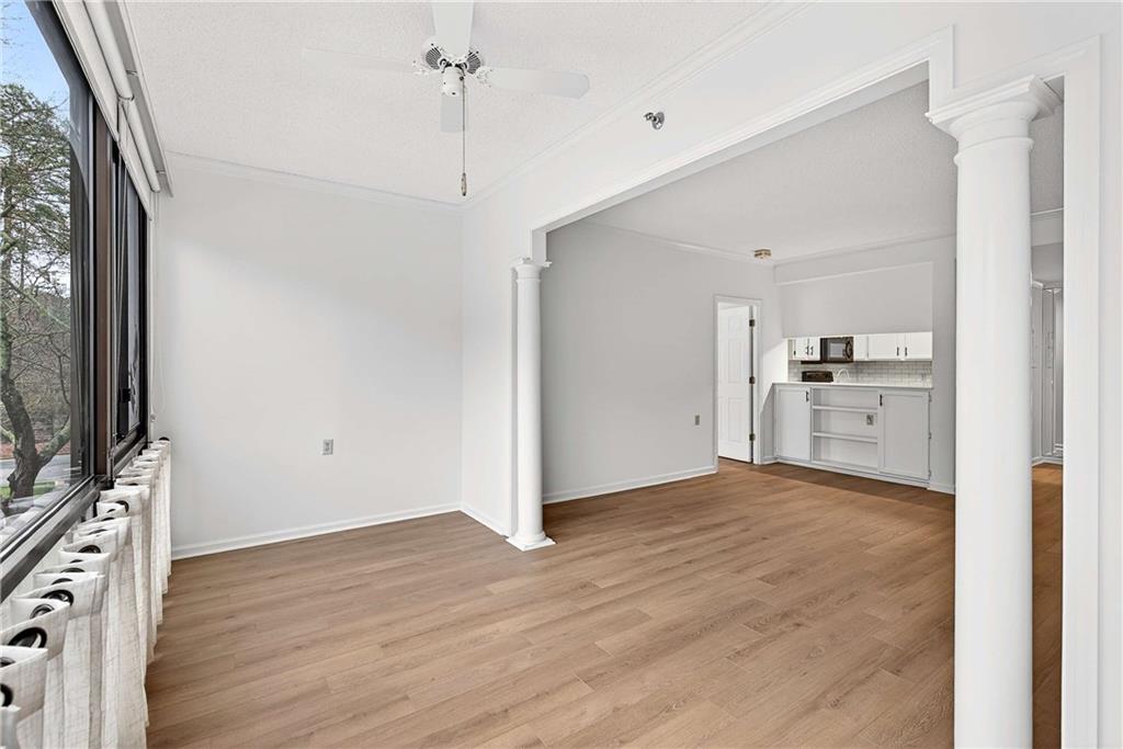 1800 Clairmont Lake, Unit A227 Decatur, GA 30033 - Photo 20 of 69 a view of a kitchen with wooden floor and a sink