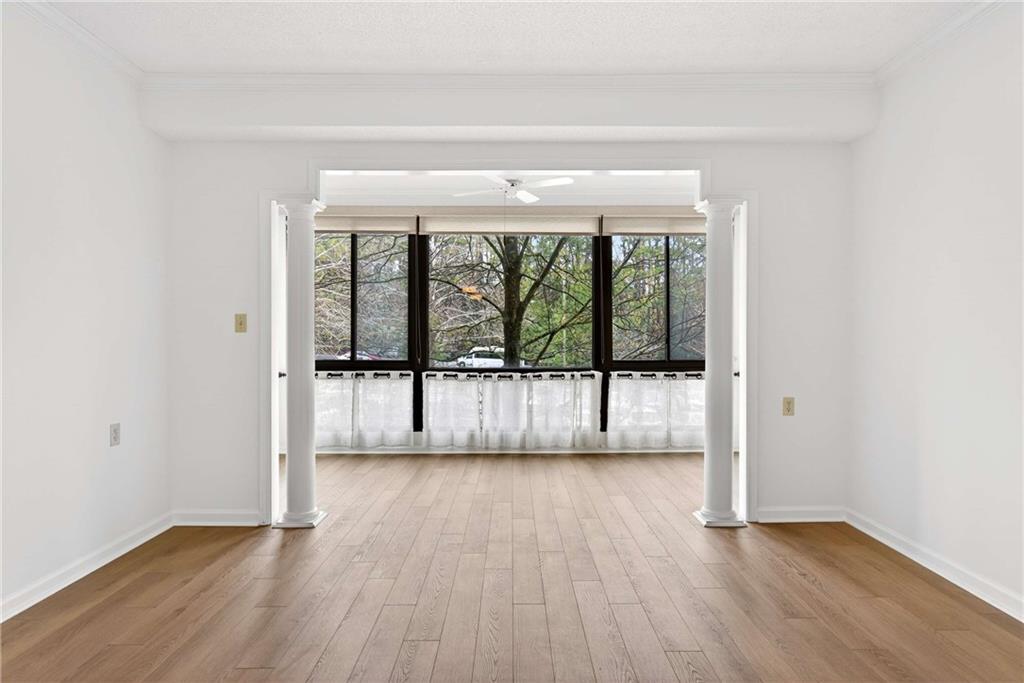 1800 Clairmont Lake, Unit A227 Decatur, GA 30033 - Photo 22 of 69 wooden floor in an empty room with a window