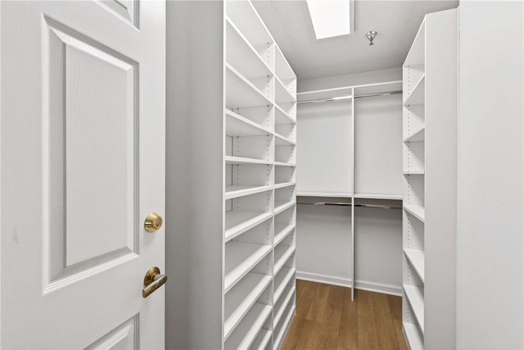 1800 Clairmont Lake, Unit A227 Decatur, GA 30033 - Photo 33 of 69 a view of walk in closet with empty racks