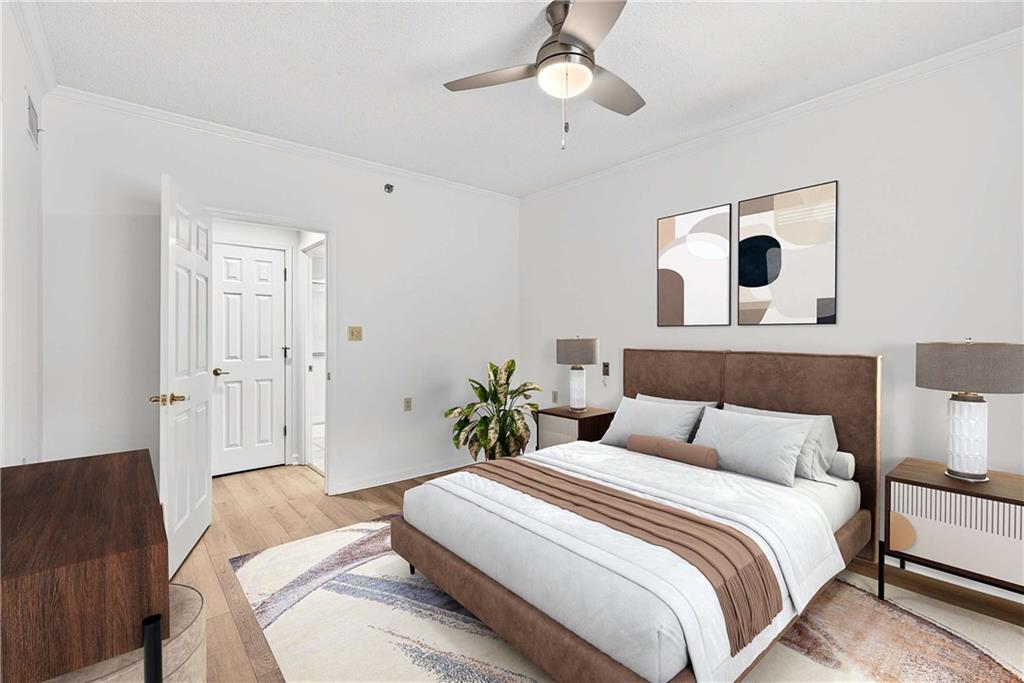 1800 Clairmont Lake, Unit A227 Decatur, GA 30033 - Photo 35 of 69 a bedroom with bed and a large mirror
