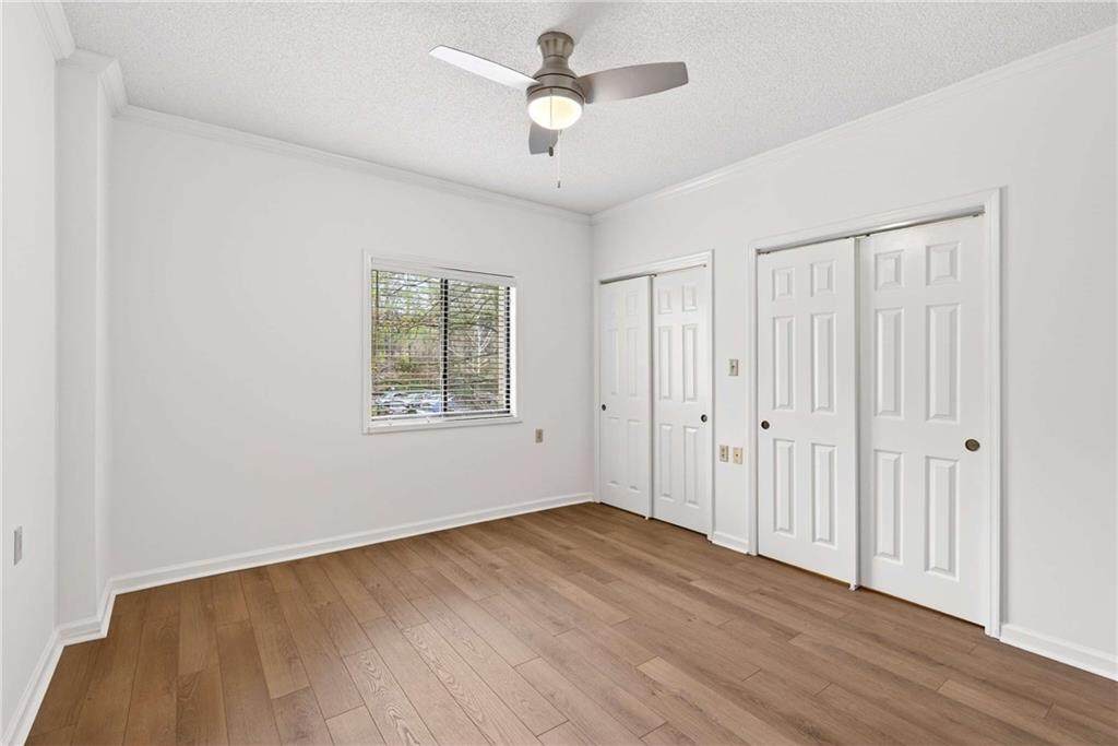 1800 Clairmont Lake, Unit A227 Decatur, GA 30033 - Photo 37 of 69 wooden floor in an empty room with a window