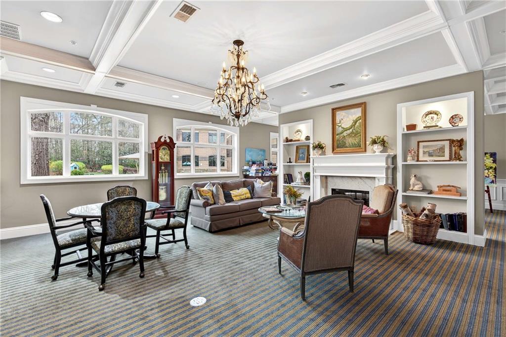 1800 Clairmont Lake, Unit A227 Decatur, GA 30033 - Photo 40 of 69 a living room with furniture and a fireplace