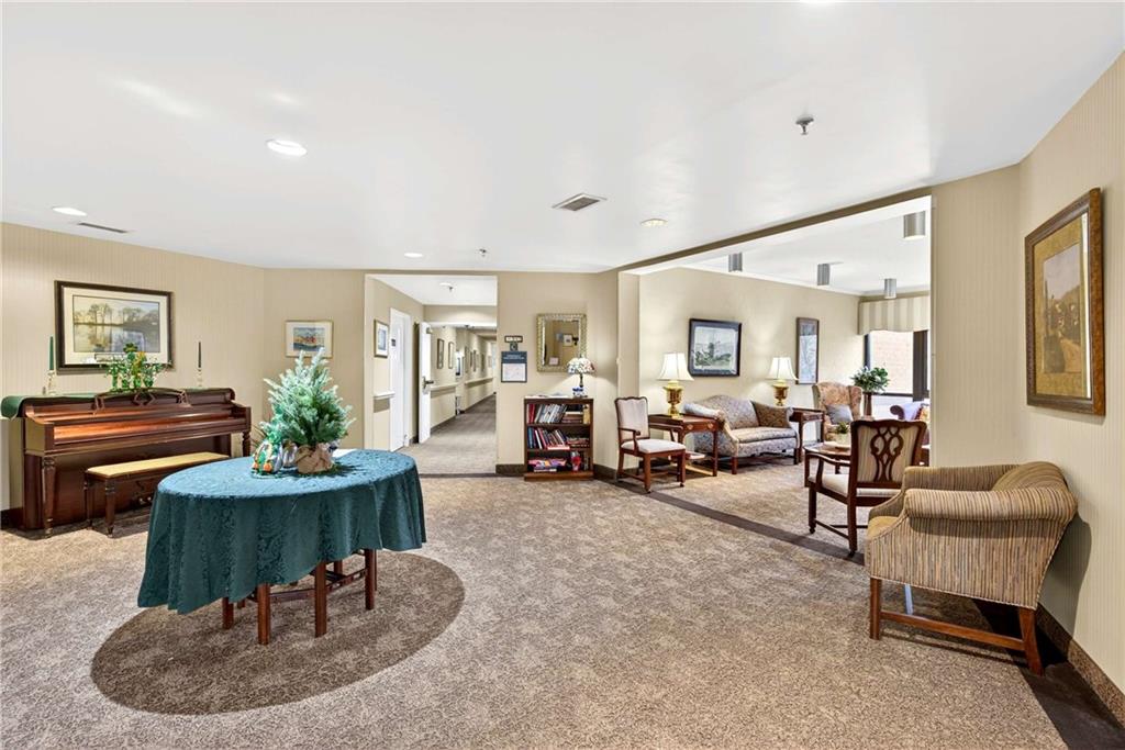 1800 Clairmont Lake, Unit A227 Decatur, GA 30033 - Photo 53 of 69 a living room with furniture and a table