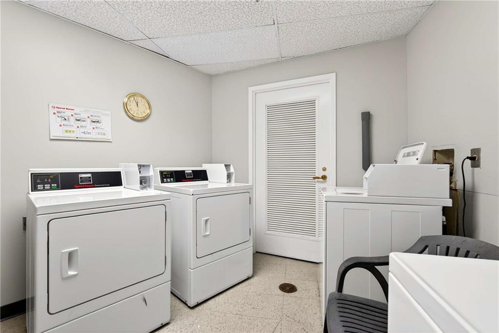 1800 Clairmont Lake, Unit A227 Decatur, GA 30033 - Photo 57 of 69 a room with a washer and dryer