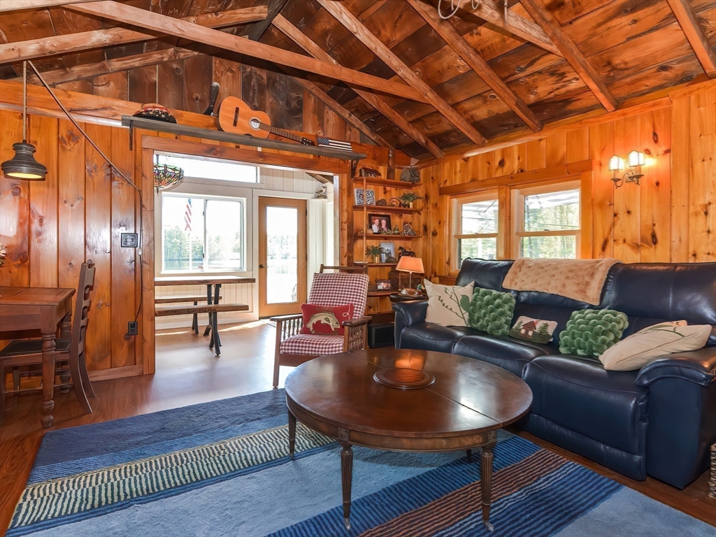 38 Cote Lane Sutton, MA 01590 - Photo 14 of 33 a living room with furniture and wooden floor