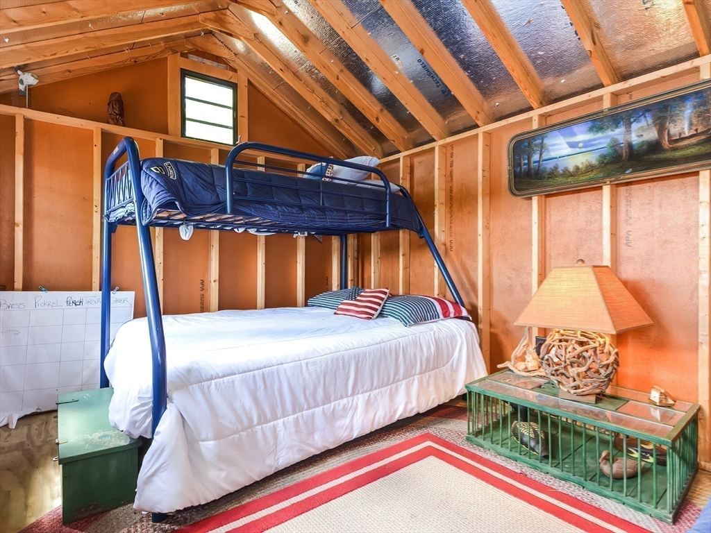 38 Cote Lane Sutton, MA 01590 - Photo 22 of 33 a bedroom with a bed and a window