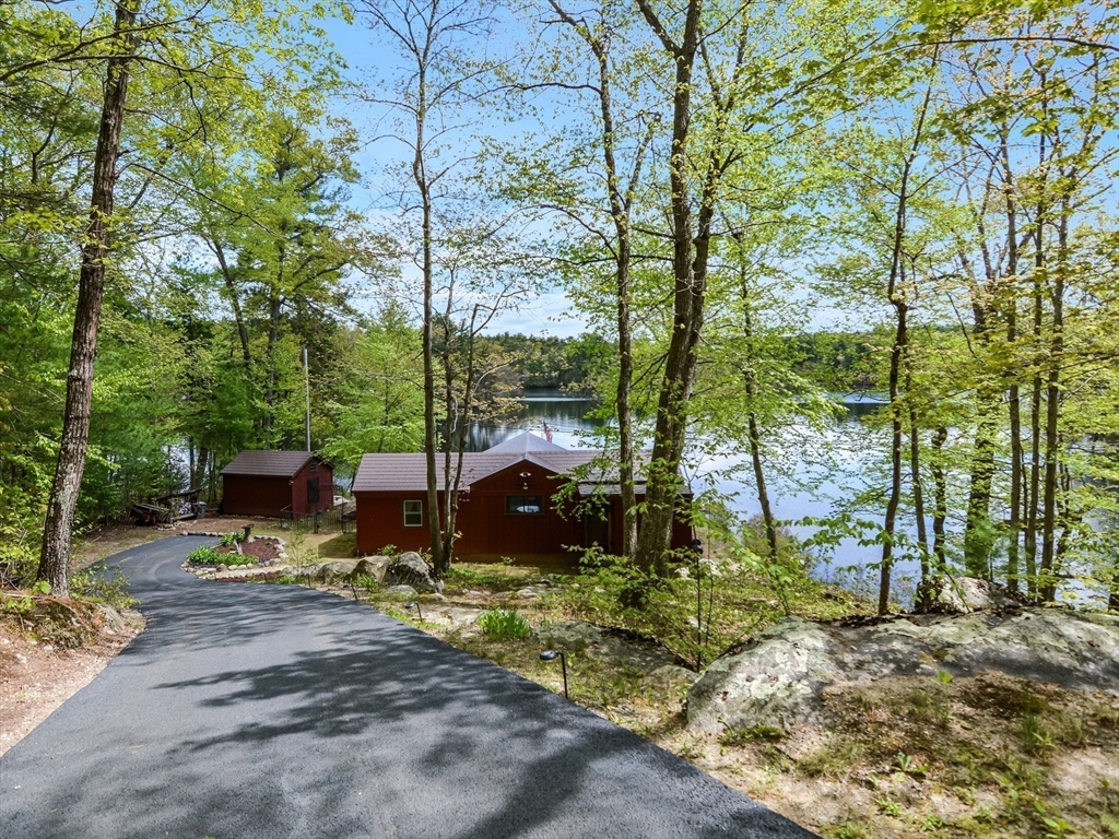 38 Cote Lane Sutton, MA 01590 - Photo 27 of 33 a view of a street with large trees