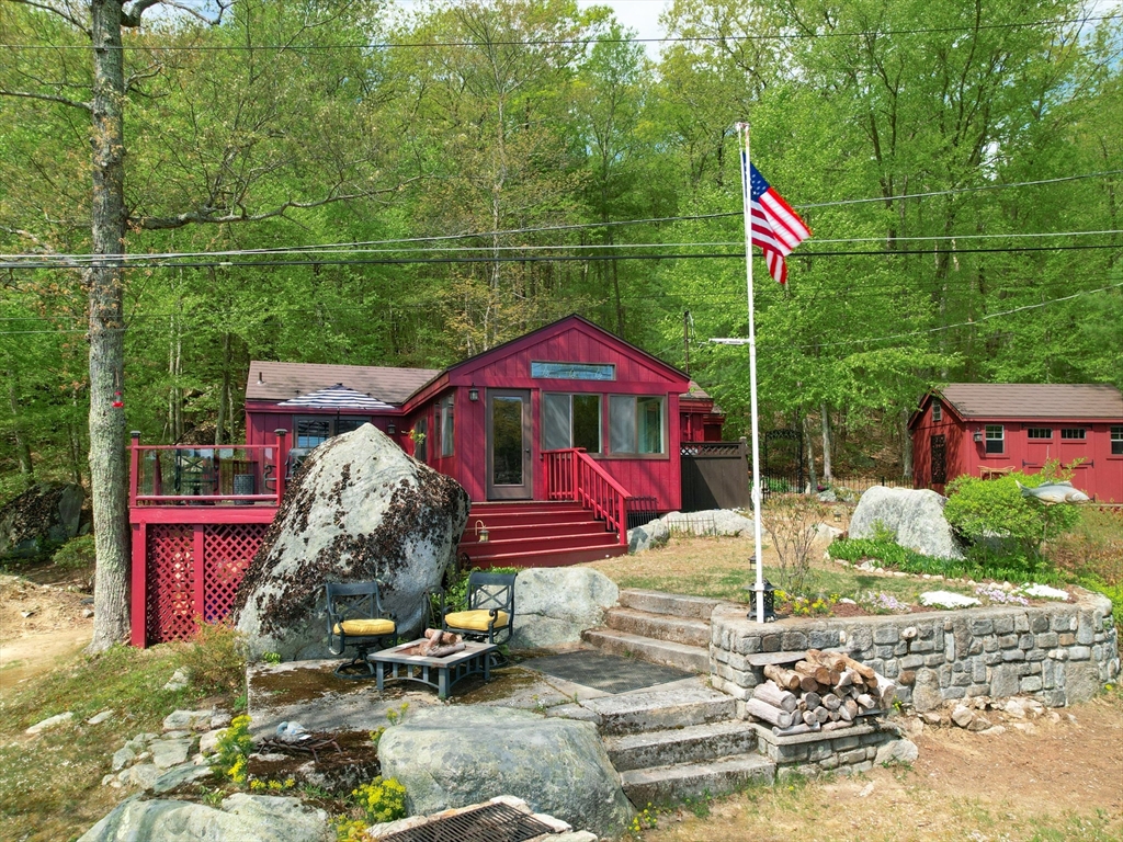 38 Cote Lane Sutton, MA 01590 - Photo 31 of 33 a front view of a house with yard and staircase