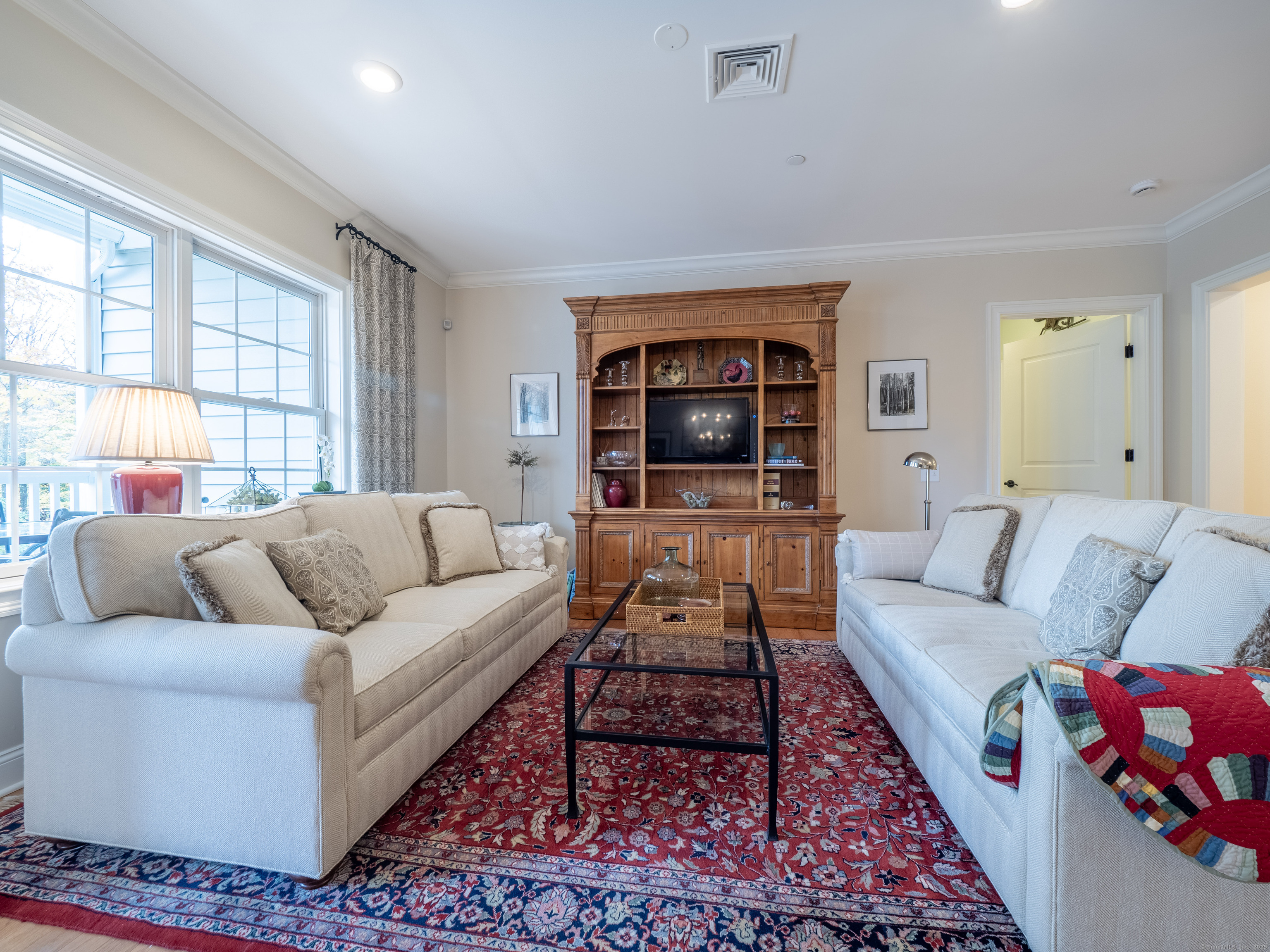 77 Sunset Lane, Unit 223 Ridgefield, CT 06877 - Photo 13 of 38 a living room with furniture and a couch