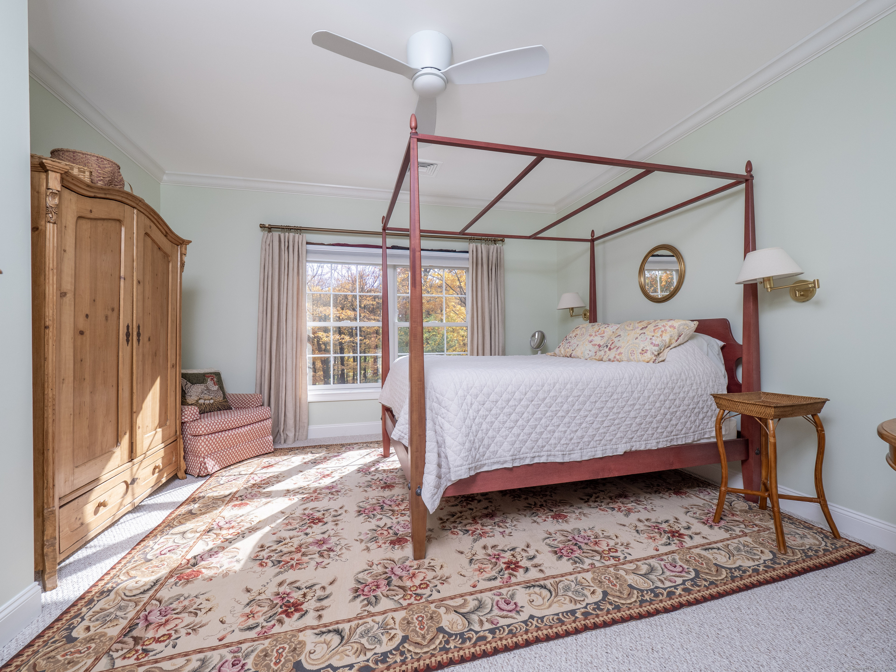 77 Sunset Lane, Unit 223 Ridgefield, CT 06877 - Photo 16 of 38 a bedroom with a bed window and a table
