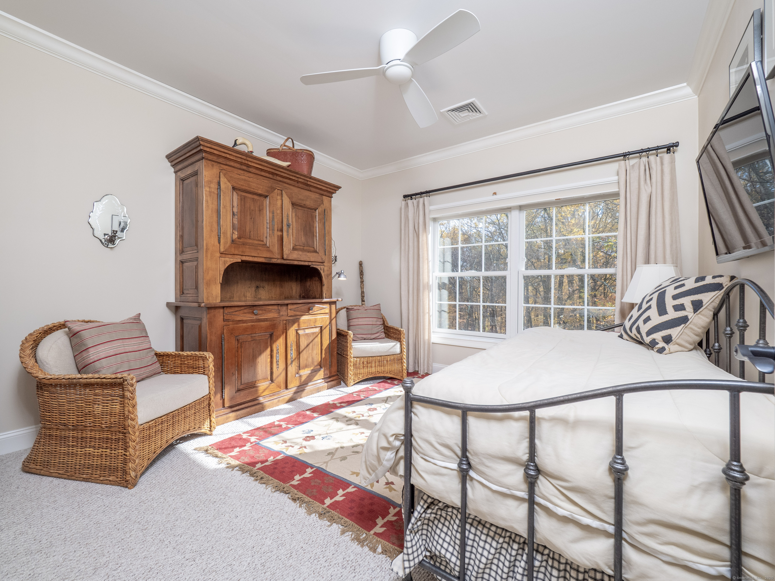 77 Sunset Lane, Unit 223 Ridgefield, CT 06877 - Photo 20 of 38 a bedroom with furniture and a window