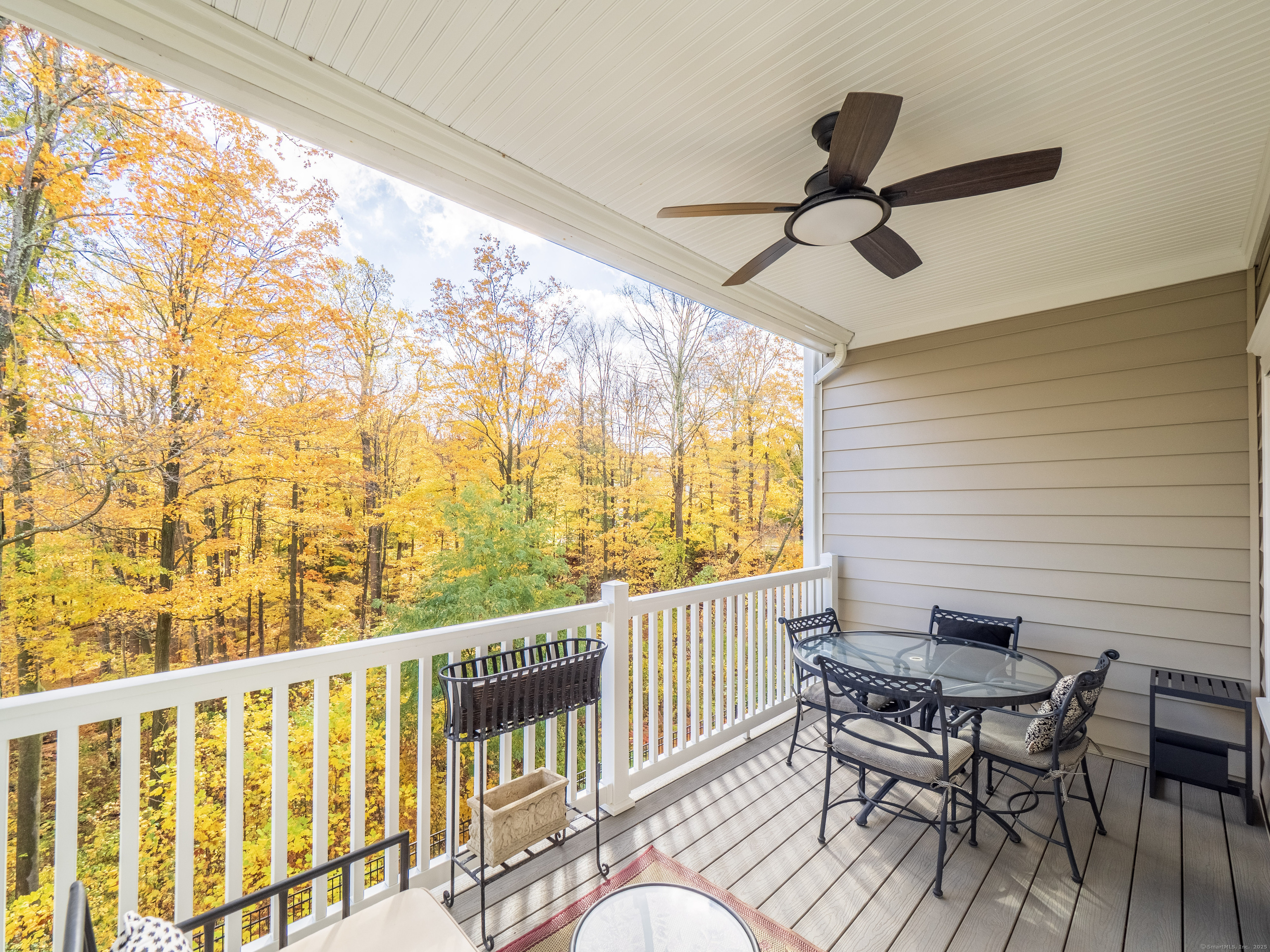 77 Sunset Lane, Unit 223 Ridgefield, CT 06877 - Photo 26 of 38 a view of a balcony with furniture