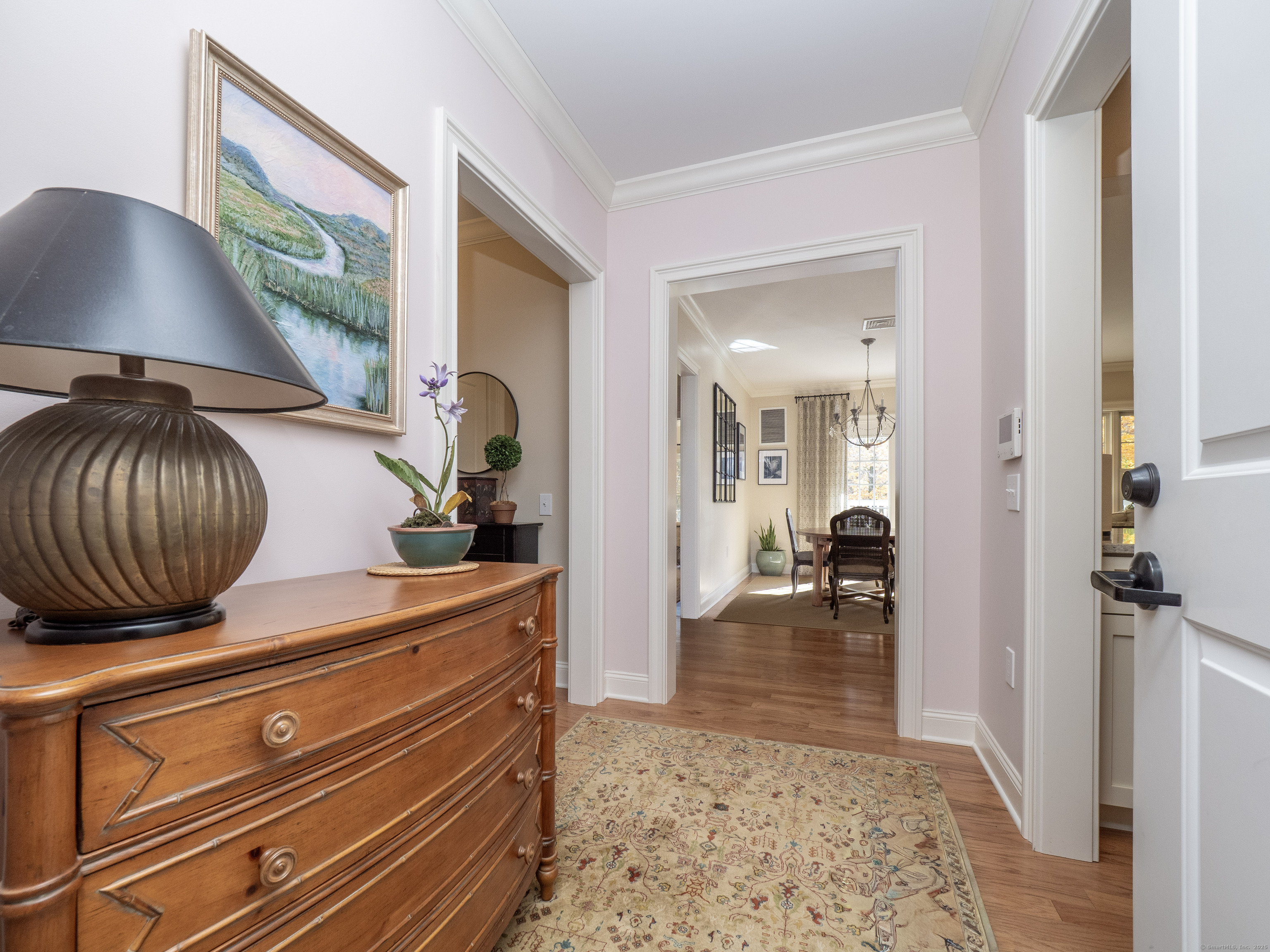 77 Sunset Lane, Unit 223 Ridgefield, CT 06877 - Photo 4 of 38 a view of living room and bedroom with furniture