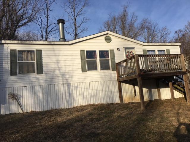 1245 McDearmon Road Montvale, VA 24122 - Photo 1 of 12 a front view of a house with a yard