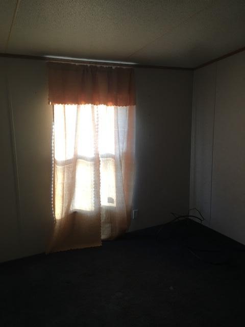 1245 McDearmon Road Montvale, VA 24122 - Photo 7 of 12 a view of wooden floor and a window in an empty room