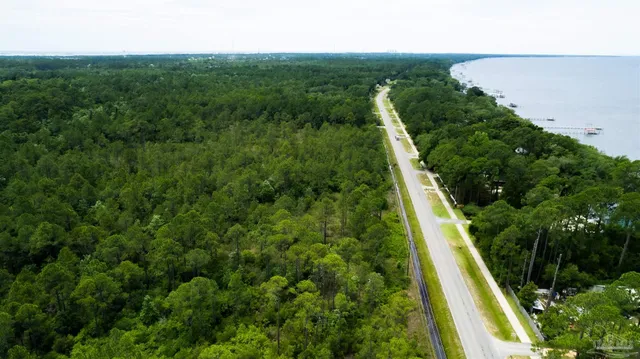 a view of swimming pool from a balcony