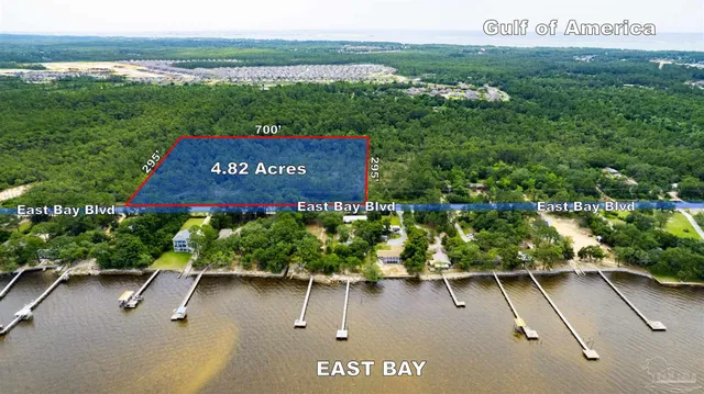a view of a sign board with an ocean view