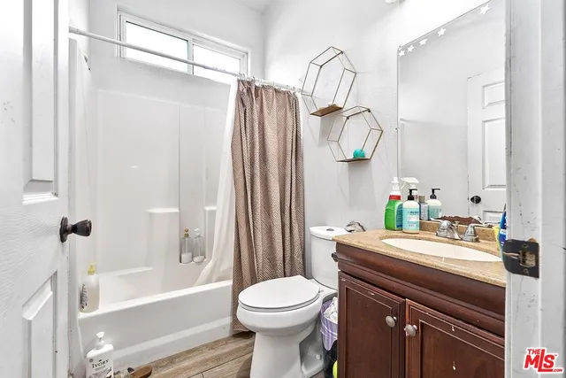 a bedroom with toys and a bed