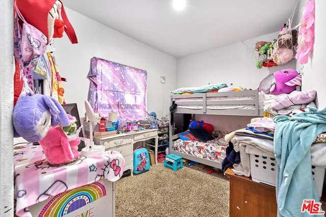 a childrens park with lots of swings and slides