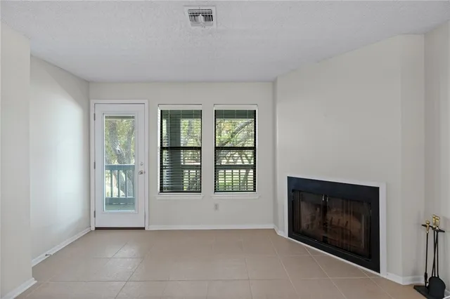 a bathroom with a sink a shower and a mirror