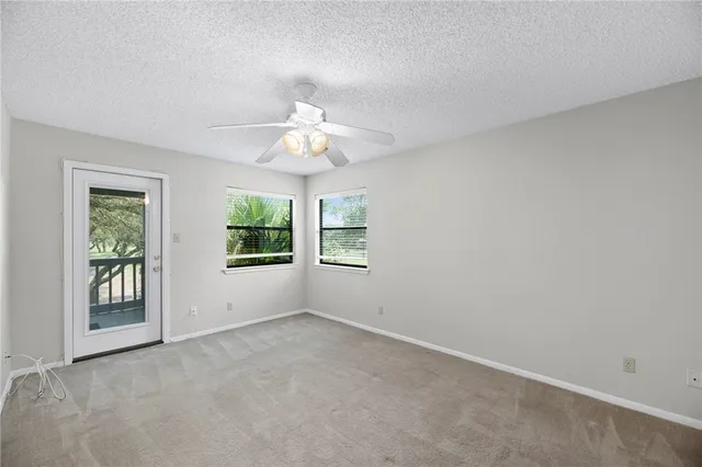 a kitchen with cabinets stainless steel appliances and sink