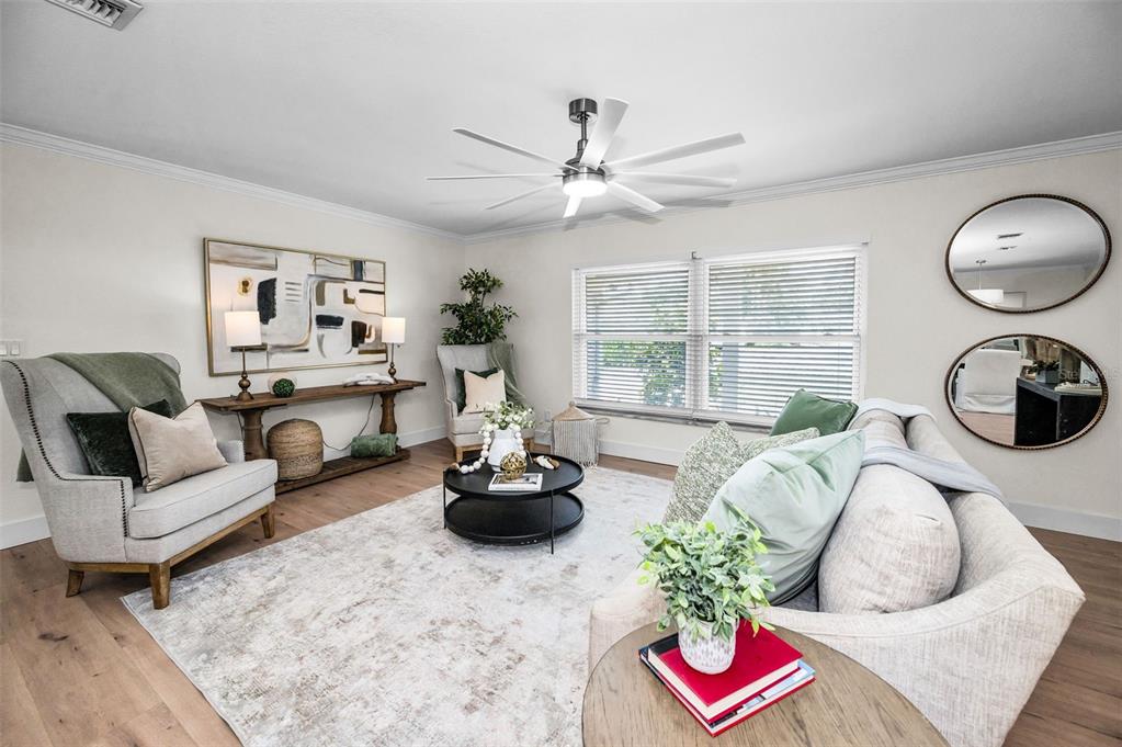 409 Barbara Lane Tampa, FL 33609 - Photo 14 of 51 a living room with furniture and a large window