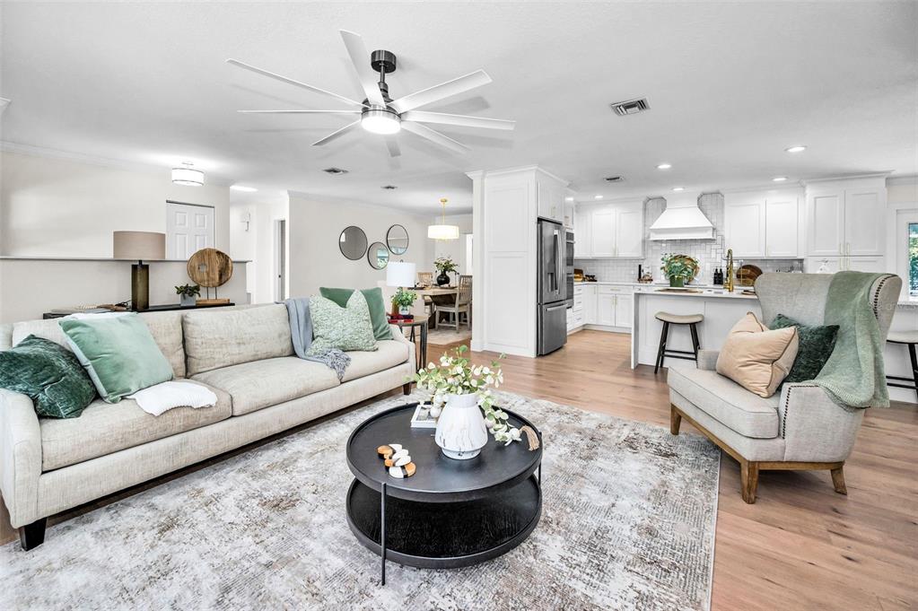 409 Barbara Lane Tampa, FL 33609 - Photo 25 of 51 a living room with furniture and a large window
