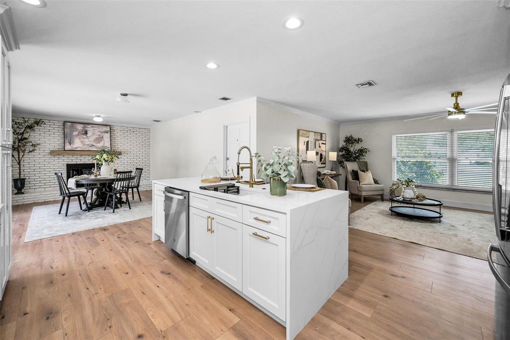 409 Barbara Lane Tampa, FL 33609 - Photo 30 of 51 a living room with furniture and a wooden floor