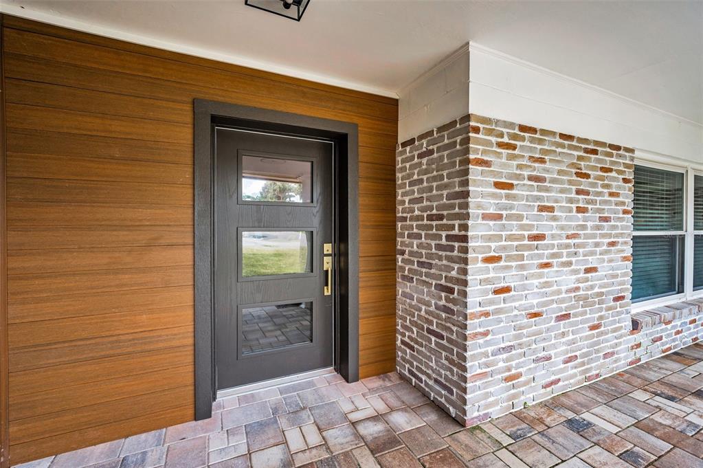 409 Barbara Lane Tampa, FL 33609 - Photo 5 of 51 a view of wooden door