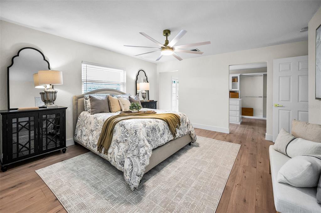 409 Barbara Lane Tampa, FL 33609 - Photo 7 of 51 a bedroom with a bed and dresser