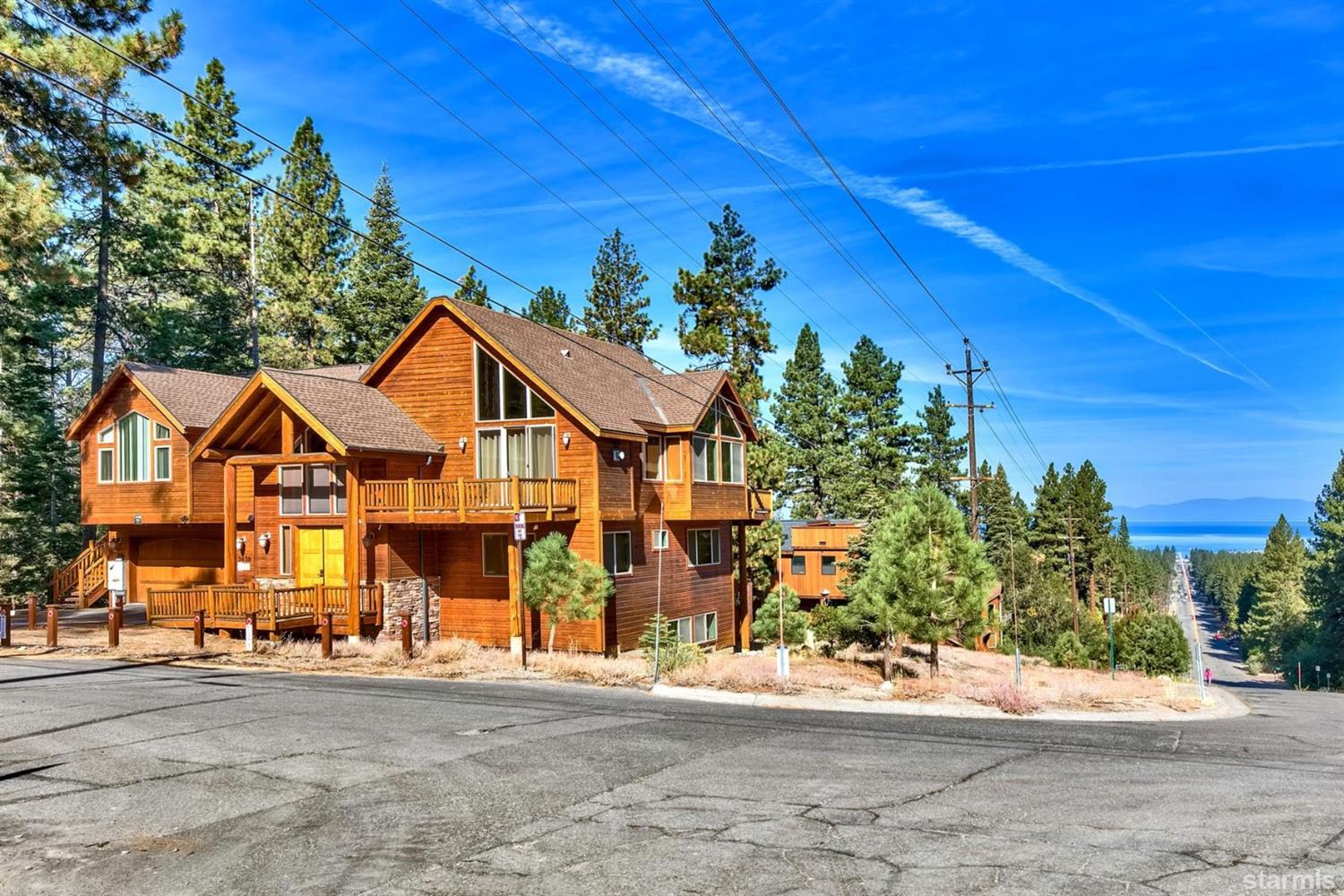 3639 Saddle Road South Lake Tahoe, CA 96150 - Photo 2 of 25 a front view of a house with a yard