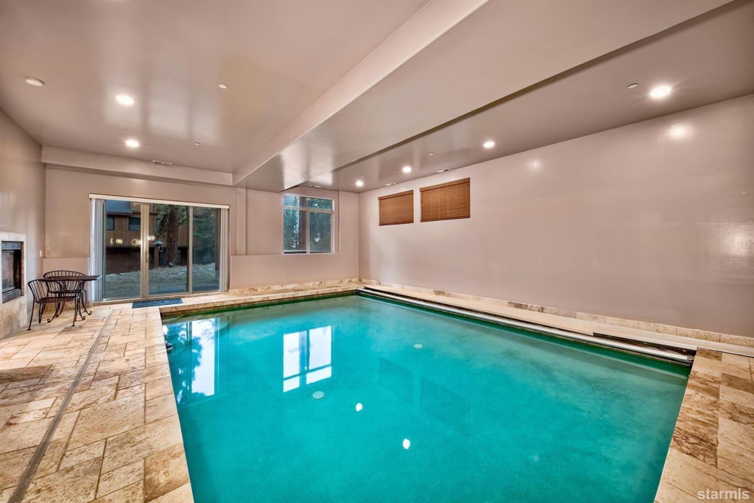 3639 Saddle Road South Lake Tahoe, CA 96150 - Photo 15 of 25 a swimming pool with yard